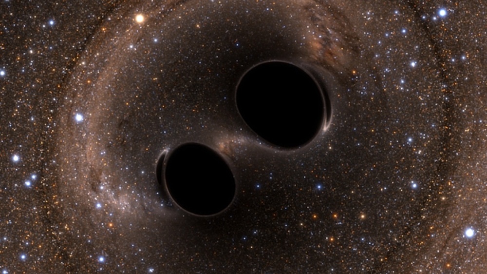 Piirroskuva gravitaatioaaltoja lähettäneistä mustista aukoista